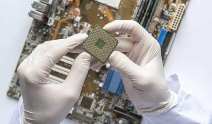 the-scientist-hands-in-gloves-work-with-a-circuit-2024-09-24-01-03-24-utc